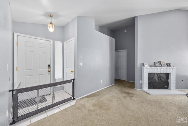 7507 Hidden Bridge Dr, Bakersfield, CA 93313 - carpeted entryway with a brick fireplace and baseboards