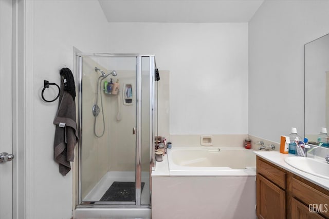 7507 Hidden Bridge Dr, Bakersfield, CA 93313 - bathroom with a stall shower, vanity, and a garden tub