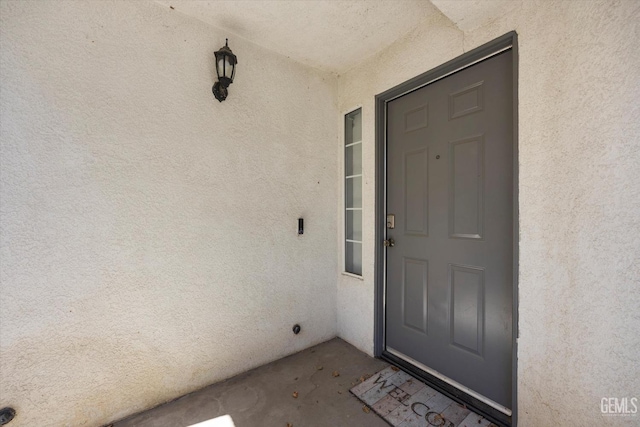 7507 Hidden Bridge Dr, Bakersfield, CA 93313 - view of exterior entry featuring stucco siding