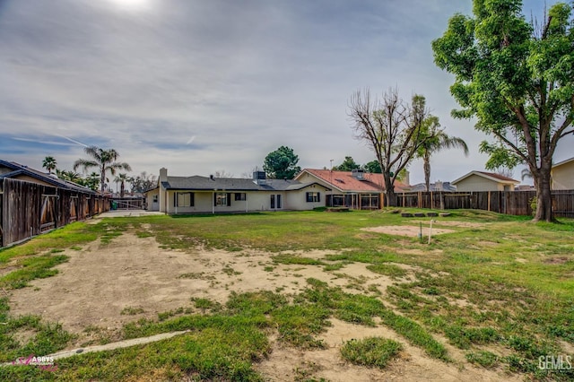 view of yard with fence