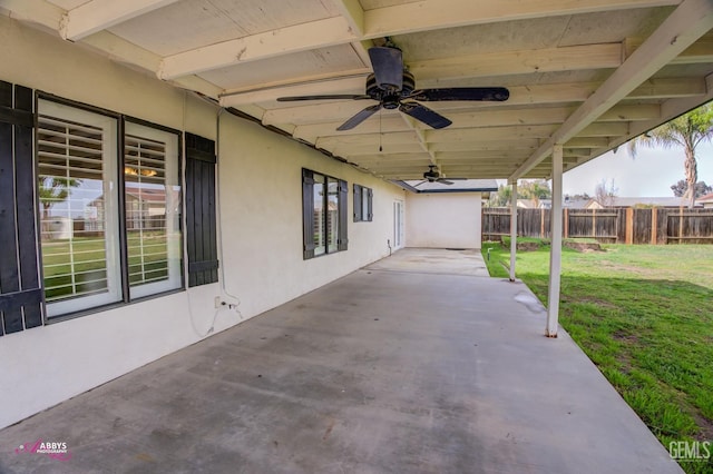 view of patio / terrace featuring a ceiling fan and fence