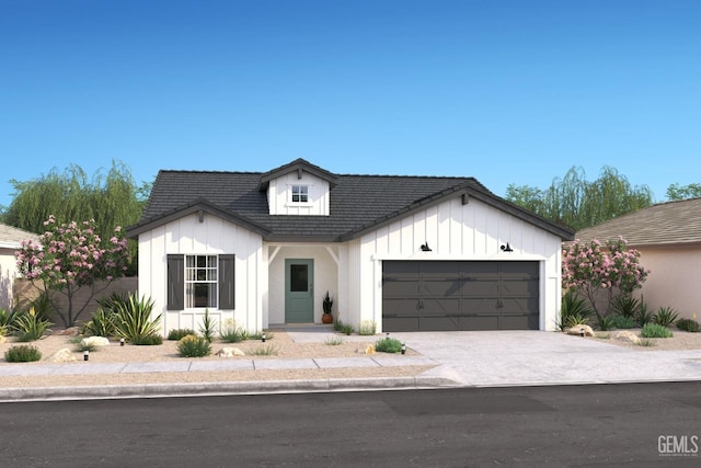 modern inspired farmhouse with a garage, concrete driveway, board and batten siding, and a tile roof