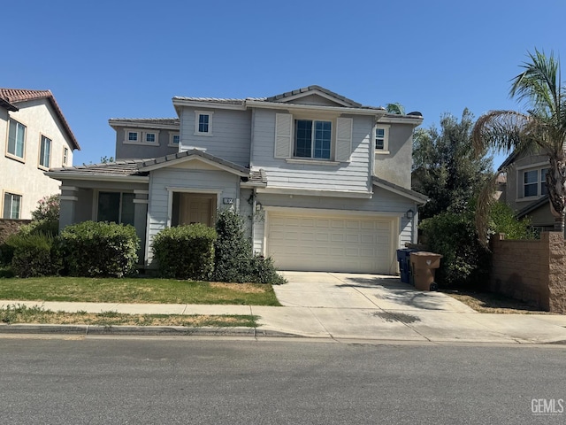 11109 Baltra Way, Bakersfield, CA 93306 - traditional home with concrete driveway, an attached garage, and a tile roof