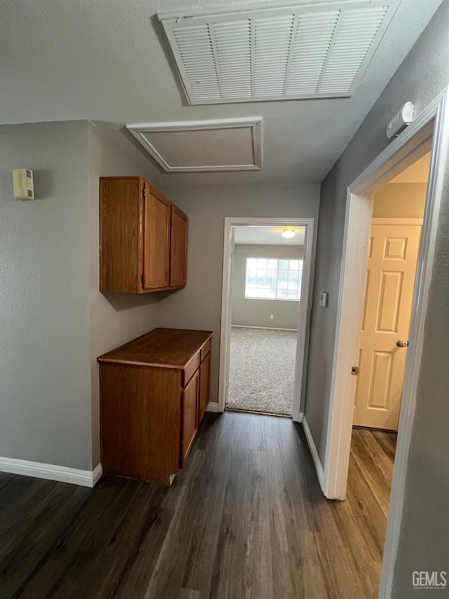 hall featuring dark hardwood / wood-style floors