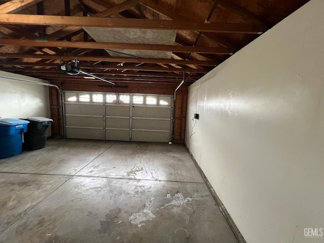 garage featuring a garage door opener