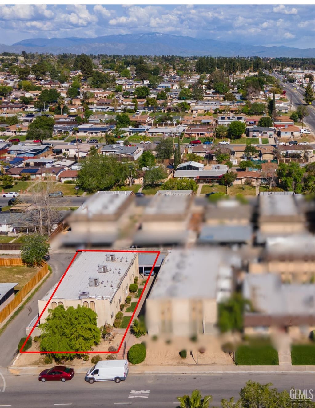 2713 Haley St, Bakersfield, CA 93305 - aerial overview of property's location with property boundaries highlighted and mountains