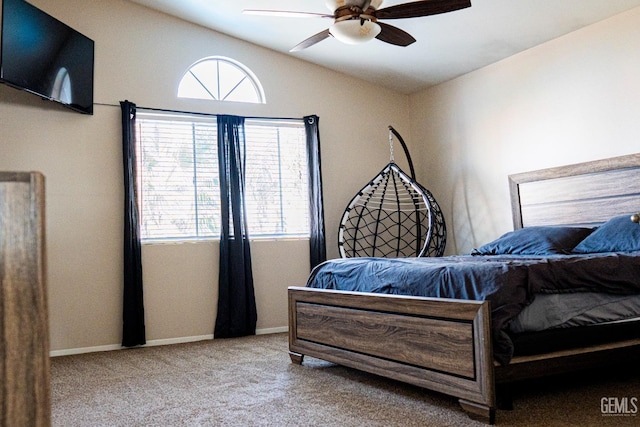 carpeted bedroom with ceiling fan and lofted ceiling