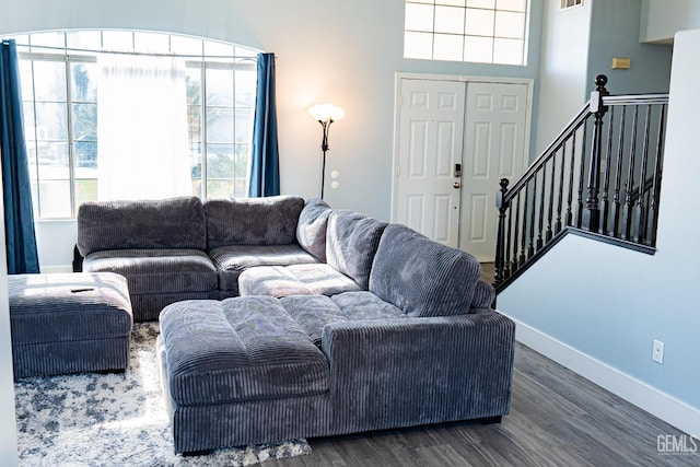 living room with dark wood-type flooring