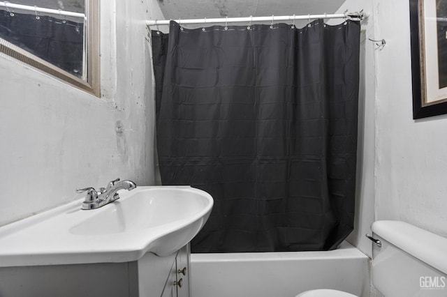 full bathroom with shower / tub combo, toilet, and vanity
