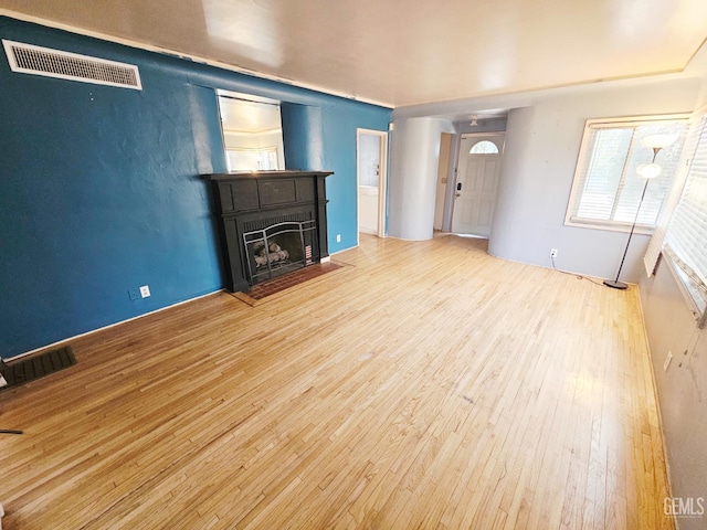 2313 Alturas Dr, Bakersfield, CA 93305 - unfurnished living room with wood finished floors and a fireplace