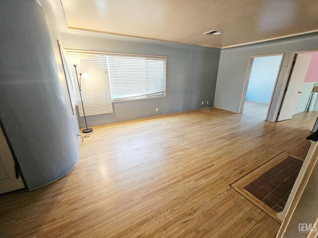 2313 Alturas Dr, Bakersfield, CA 93305 - empty room with wood finished floors