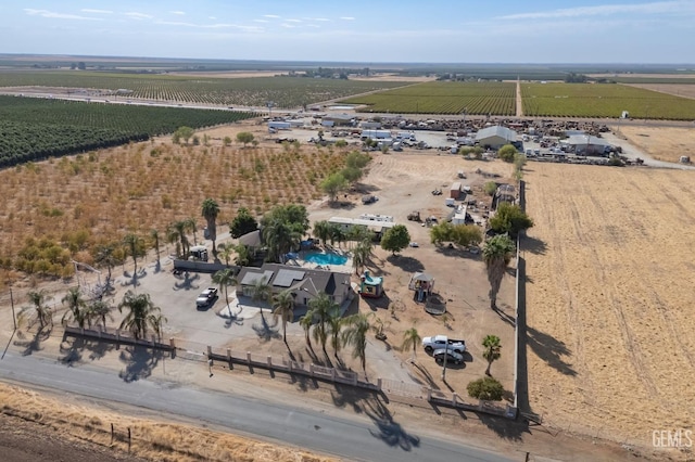 birds eye view of property with a rural view