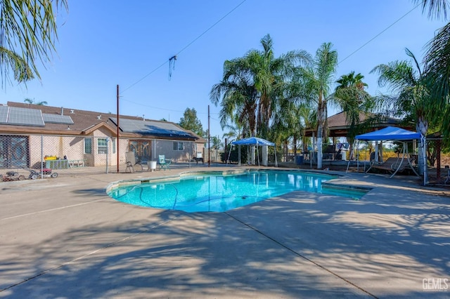 view of swimming pool featuring a patio