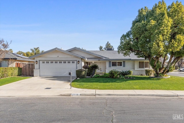 ranch-style home featuring a front lawn and a garage