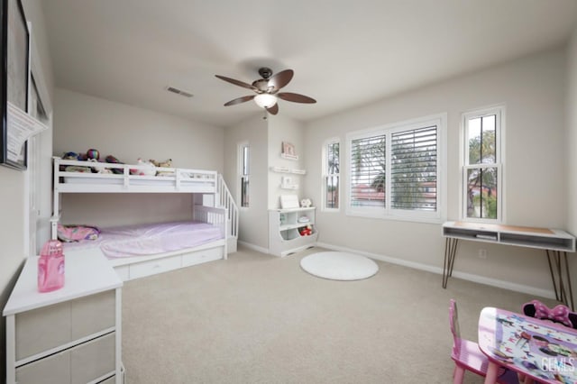 bedroom with a ceiling fan, carpet, visible vents, and baseboards