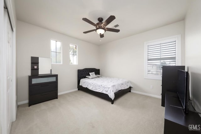 bedroom featuring carpet, ceiling fan, and baseboards