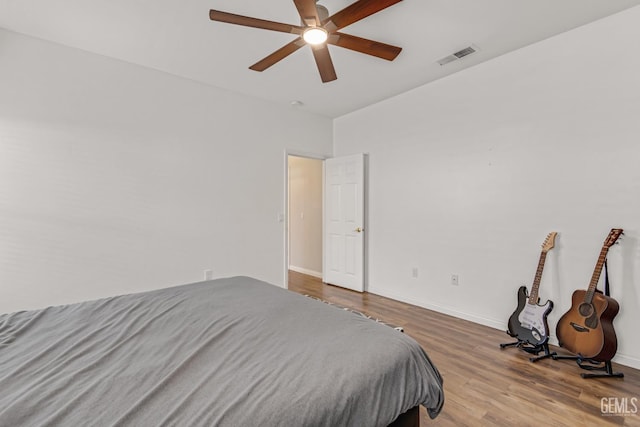 6413 Lavender Gate Dr, Bakersfield, CA 93312 - bedroom featuring wood finished floors, baseboards, and a ceiling fan
