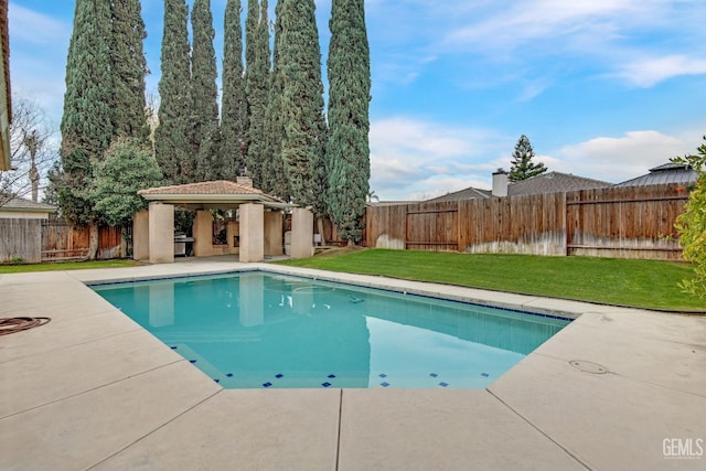 view of pool with a fenced in pool, a yard, a gazebo, a patio area, and a fenced backyard