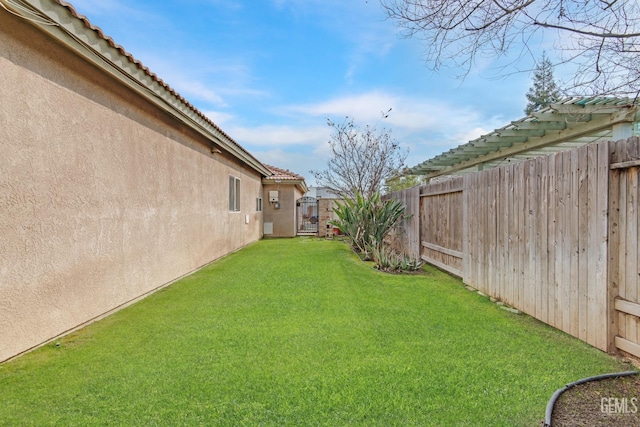 view of yard with fence