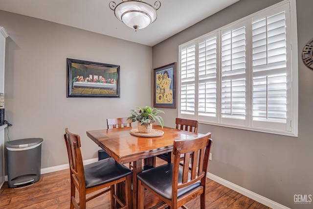 dining area featuring hardwood / wood-style flooring