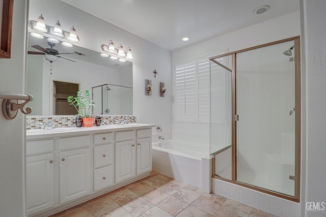 bathroom with vanity, backsplash, plus walk in shower, and ceiling fan