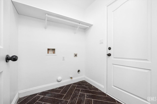 laundry room with washer hookup, dark hardwood / wood-style floors, hookup for a gas dryer, and electric dryer hookup