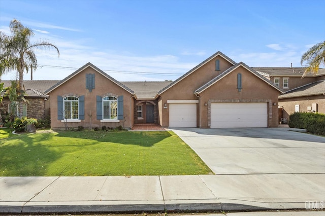 single story home with a front yard and a garage