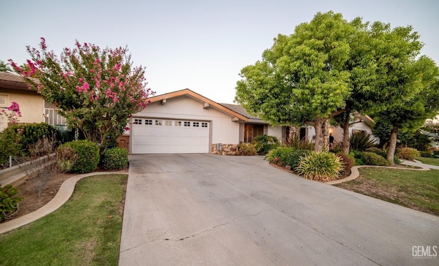 ranch-style home with a garage