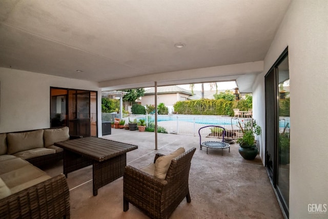 view of patio featuring a fenced in pool and an outdoor hangout area