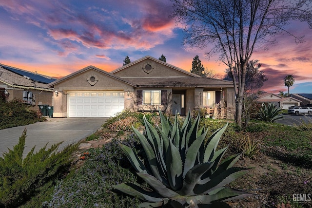 view of front of property featuring a garage