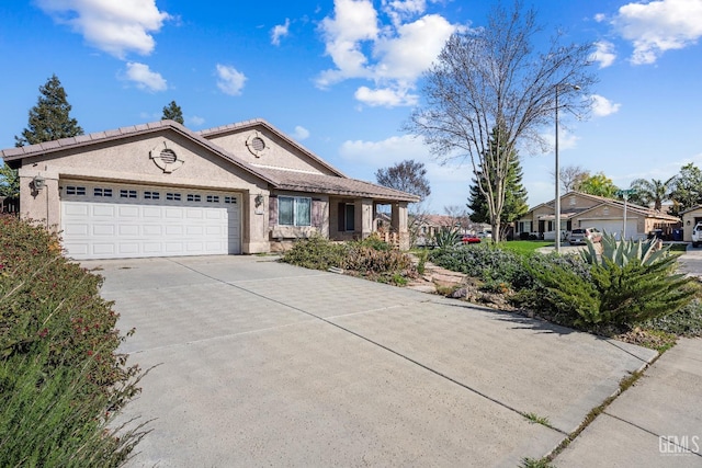 ranch-style house featuring a garage