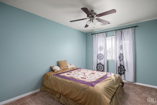 bedroom with ceiling fan and carpet flooring