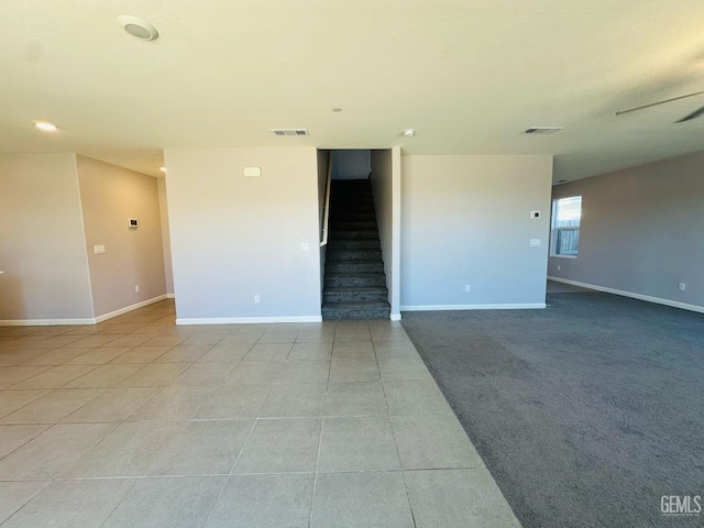 5910 Bogart Dr, Bakersfield, CA 93313 - tiled empty room featuring stairway and recessed lighting