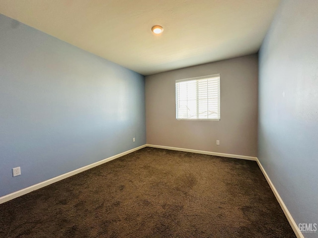 5910 Bogart Dr, Bakersfield, CA 93313 - unfurnished room featuring dark carpet