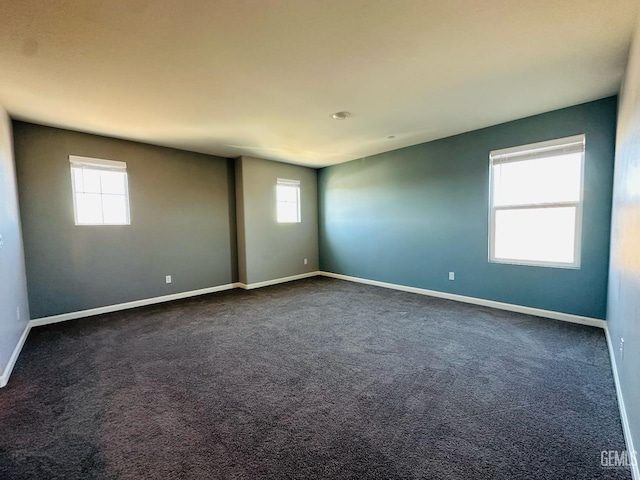 5910 Bogart Dr, Bakersfield, CA 93313 - unfurnished room featuring dark carpet