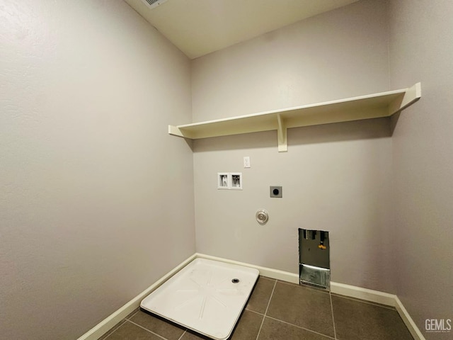 5910 Bogart Dr, Bakersfield, CA 93313 - laundry room featuring hookup for a gas dryer, hookup for an electric dryer, tile patterned floors, and washer hookup