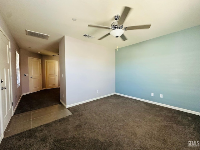 5910 Bogart Dr, Bakersfield, CA 93313 - empty room with carpet floors, a ceiling fan, and tile patterned flooring