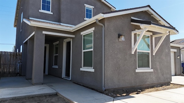 5910 Bogart Dr, Bakersfield, CA 93313 - view of property exterior with stucco siding and a patio area