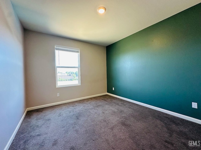 5910 Bogart Dr, Bakersfield, CA 93313 - carpeted spare room with baseboards