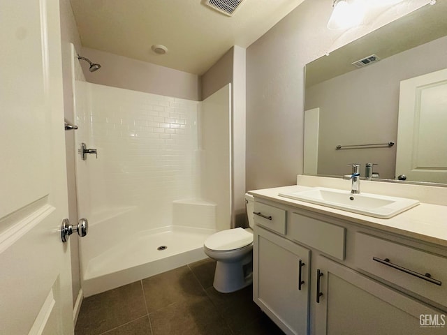 5910 Bogart Dr, Bakersfield, CA 93313 - full bathroom with tile patterned flooring, vanity, and a shower