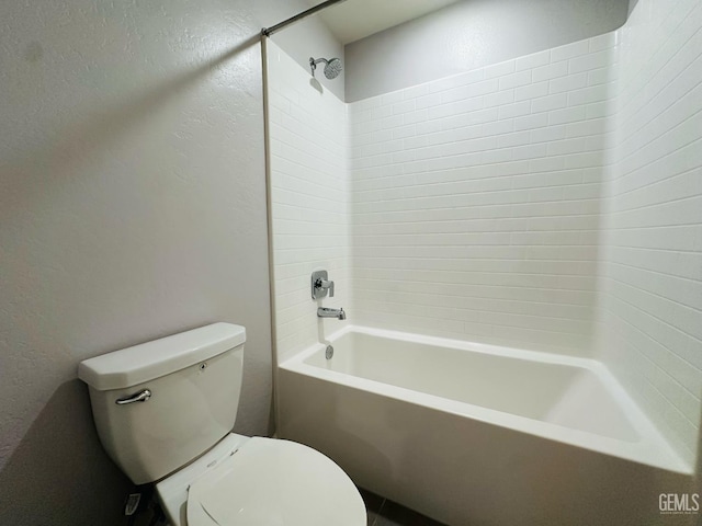 5910 Bogart Dr, Bakersfield, CA 93313 - bathroom with shower / bath combination and a textured wall