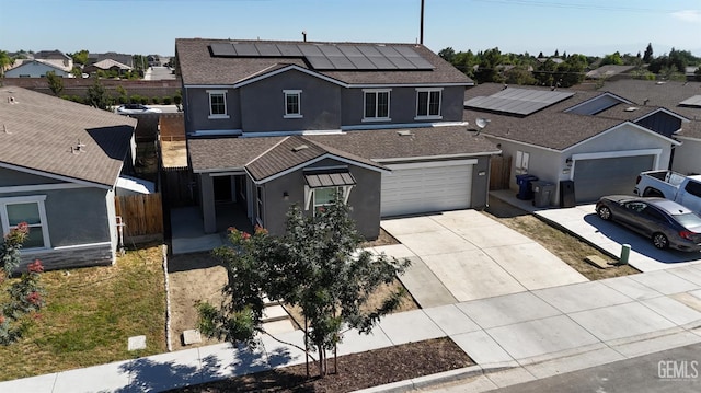 5910 Bogart Dr, Bakersfield, CA 93313 - traditional home featuring stucco siding, concrete driveway, a shingled roof, and a residential view