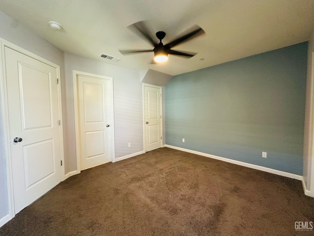 5910 Bogart Dr, Bakersfield, CA 93313 - unfurnished bedroom featuring dark carpet and a ceiling fan