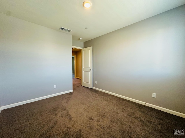 5910 Bogart Dr, Bakersfield, CA 93313 - carpeted empty room featuring baseboards