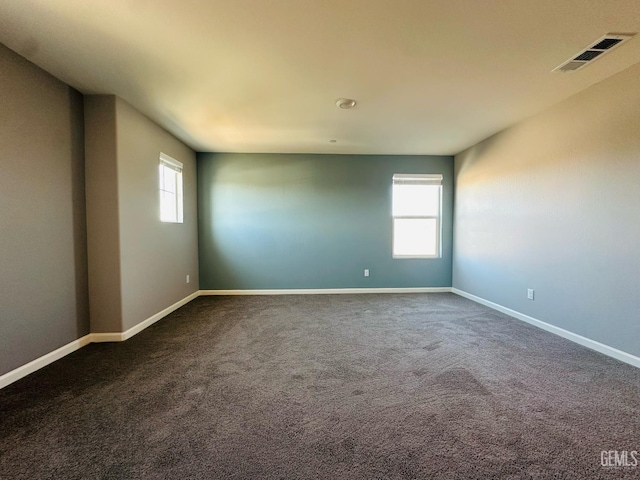 5910 Bogart Dr, Bakersfield, CA 93313 - spare room with baseboards and dark carpet