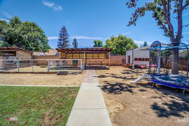 11265 Poulsen Way, Bakersfield, CA 93312 - view of yard with an exterior structure and an outdoor structure