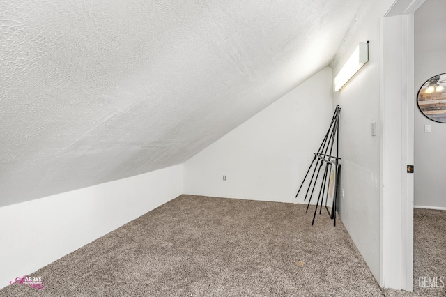 11265 Poulsen Way, Bakersfield, CA 93312 - bonus room featuring a textured ceiling, carpet, and lofted ceiling
