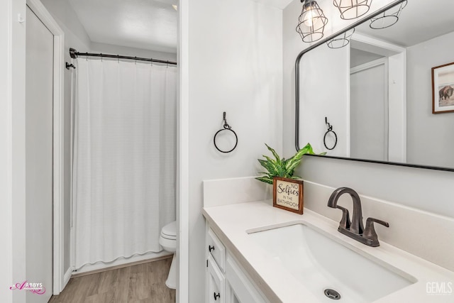 11265 Poulsen Way, Bakersfield, CA 93312 - bathroom featuring vanity and wood finished floors