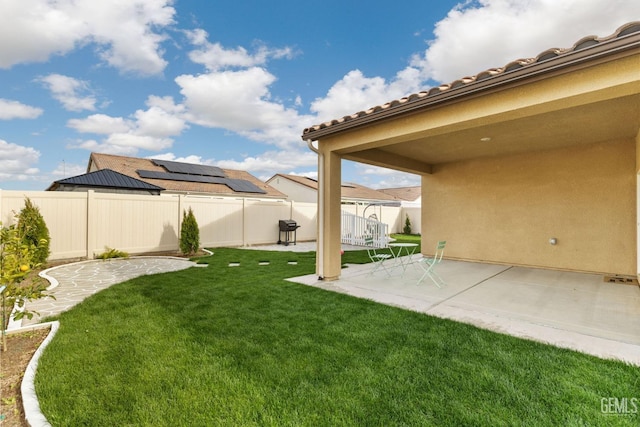 view of yard featuring a patio and a fenced backyard