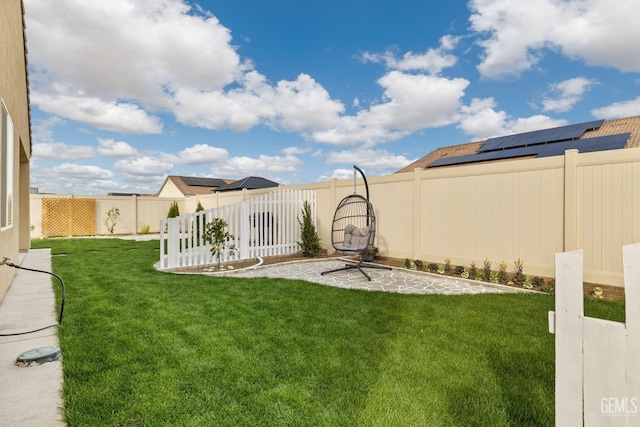 view of yard featuring a patio and a fenced backyard